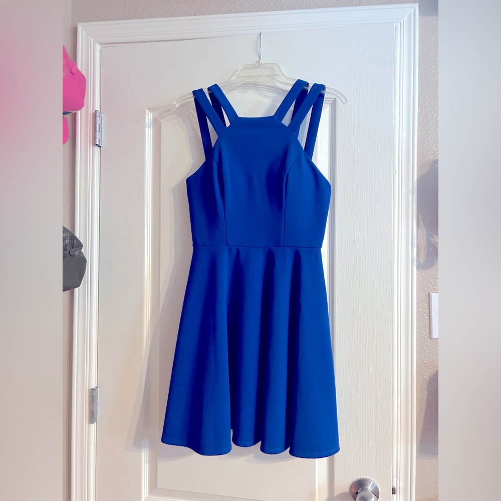 Semi formal royal blue above the knee length dress. Used twice